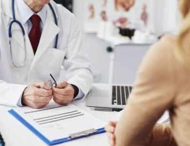 Close up of patient and doctor in doctor's office