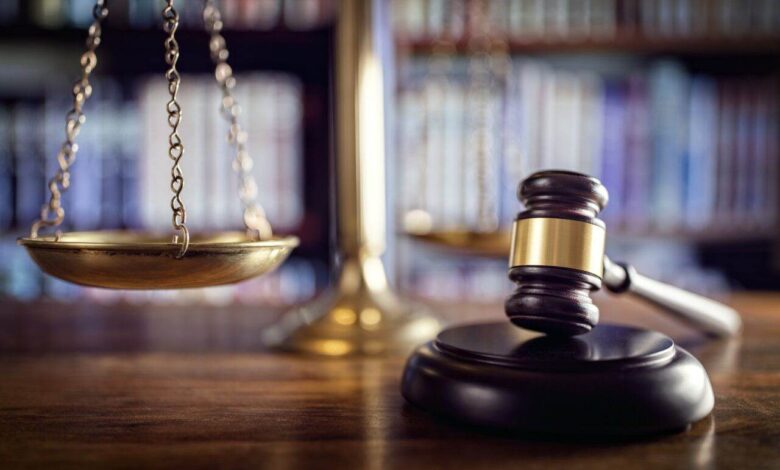 Gavel, scales of justice and law books