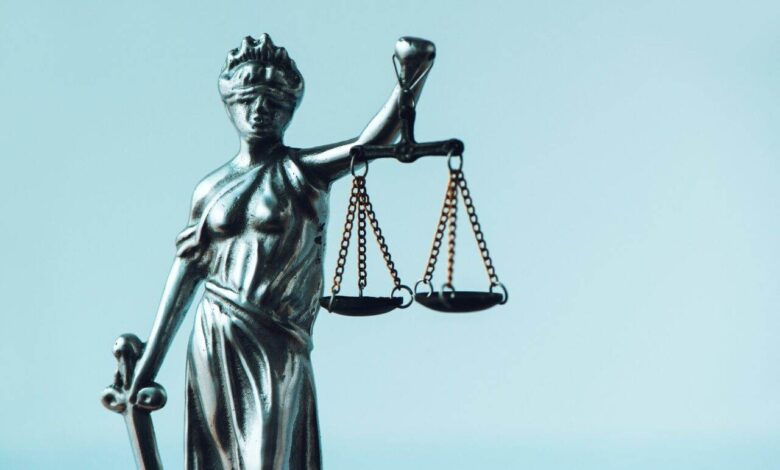 Lady Justice statue in law firm office