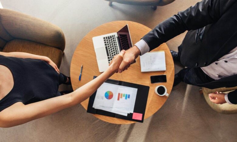 Hand shake at business meeting agreement sales