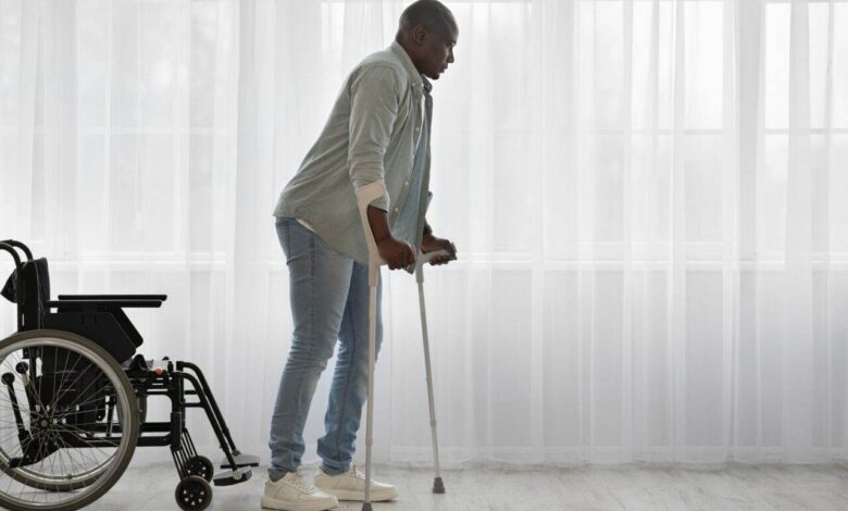 Sports, physiotherapy and patient with leg injury during crutches training