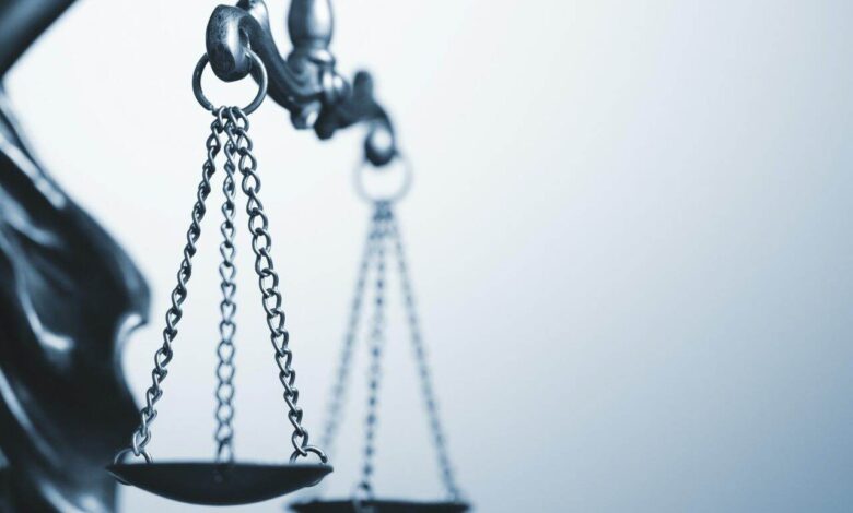 Close up detail of the scales of justice