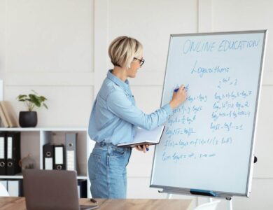 Female university tutor solving complicated math sums during online lesson, explaining logarithms on