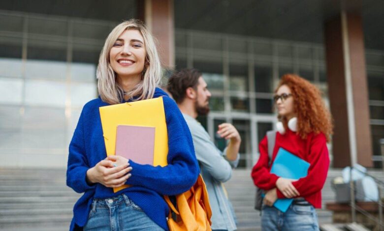 Cheerful young woman applying to university